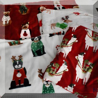 D51. Fleece Christmas dog blankets.